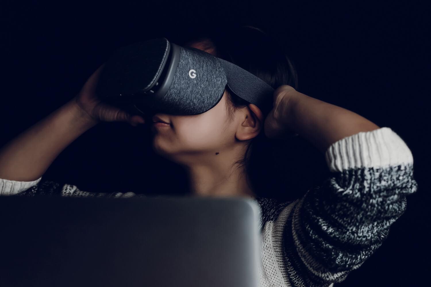 Woman using VR headset